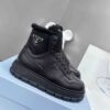 Prada Leather And Shearling High-top Sneakers