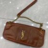 Saint Laurent Bag Medium Niki Chain Satchel in Cognac Calfskin Monogram is a sophisticated yet effortlessly chic accessory, perfect for elevating any outfit. Crafted from luxurious crinkled calfskin leather, the rich Cognac hue adds warmth and depth, while the tonal YSL monogram stitched on the front flap exudes timeless elegance.
