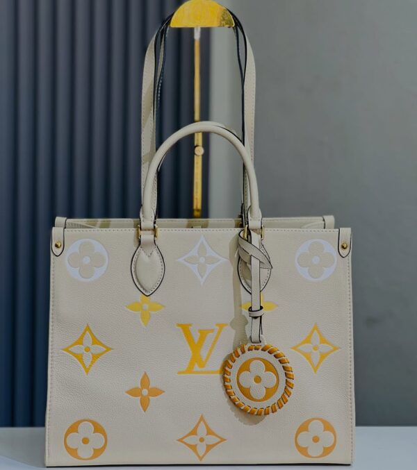 Louis Vuitton Cream Saffron Onthego MM Bag