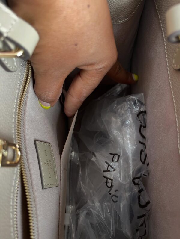 Louis Vuitton OnTheGo MM Tote in Monogram Empreinte Leather