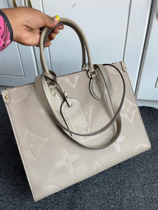 Louis Vuitton OnTheGo MM Tote in Monogram Empreinte Leather