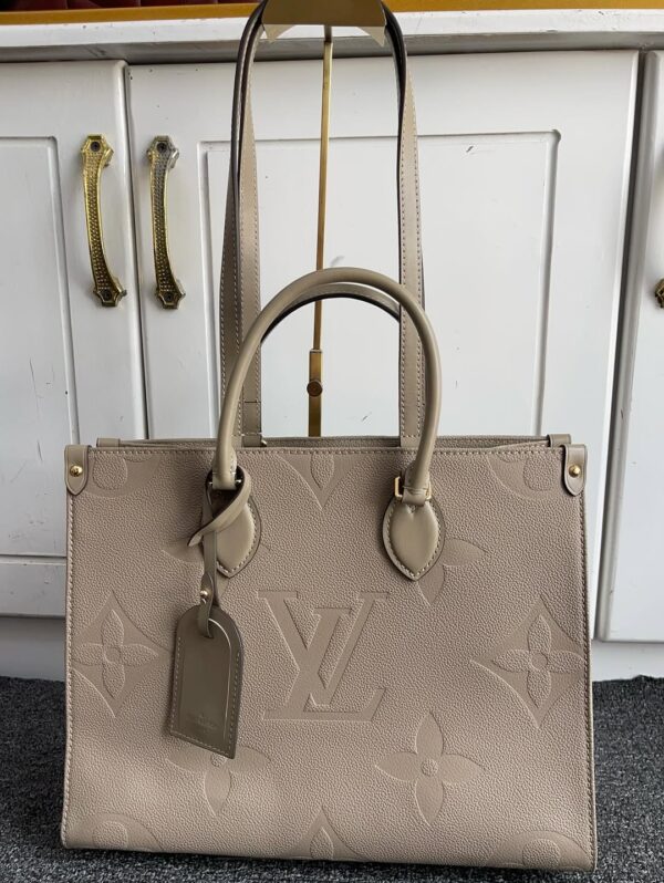 Louis Vuitton OnTheGo MM Tote in Monogram Empreinte Leather