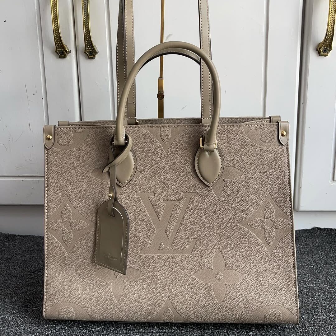 Louis Vuitton OnTheGo MM Tote in Monogram Empreinte Leather