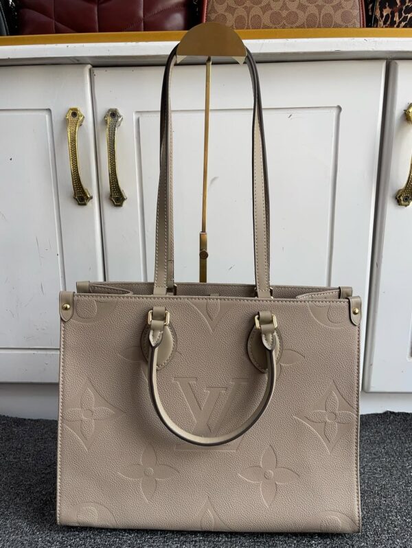 Louis Vuitton OnTheGo MM Tote in Monogram Empreinte Leather
