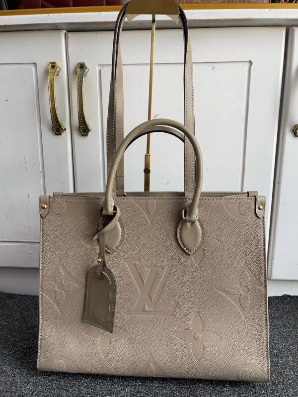 Louis Vuitton OnTheGo MM Tote in Monogram Empreinte Leather