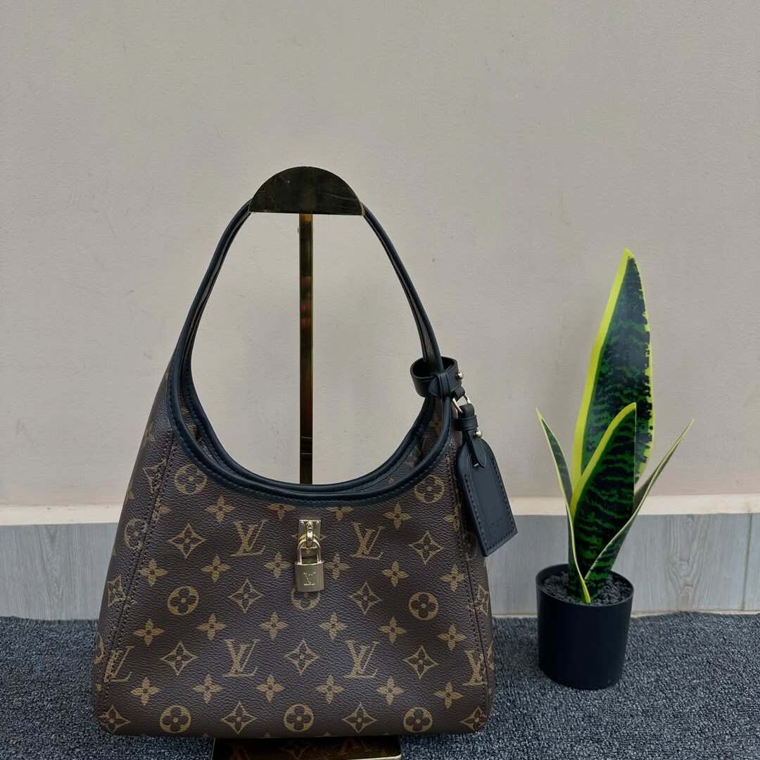 Louis Vuitton The Drop PM Monogram Handbags