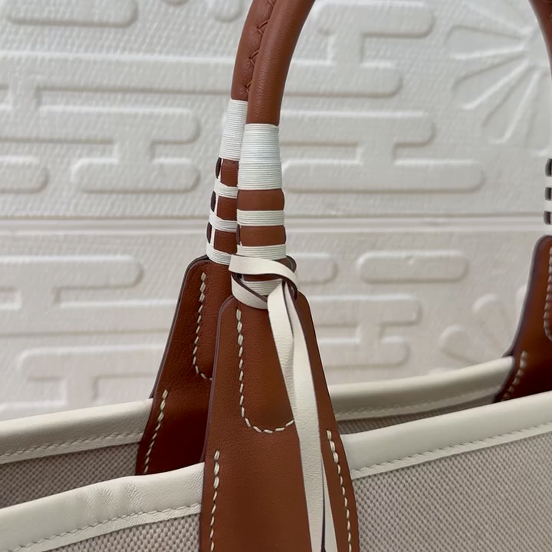 Hermès Steeple 25 Toile Canvas and Gold Swift Leather Tote Bag